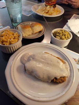 Country fried steak - comes with 2 sides and dinner rolls