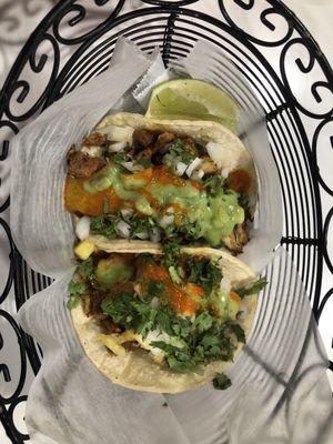 chicken and pork al pastor tacos