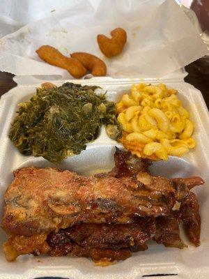 Rib dinner with greens and Mac and Cheese