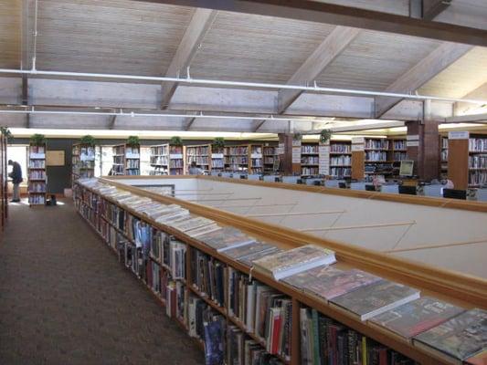 On one side of the atrium are these shelves and what might be reference materials.