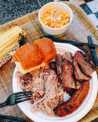 Taste of Texas (smoked brisket, smoked pulled pork & jalapeño cheddar hot link) / $21.99, Corn / $4? + Mac & cheese / $4.95