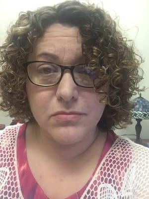 This is the haircut I got when I asked to "lose as little length as possible" on my long, curly hair. It'll take years to grow out.