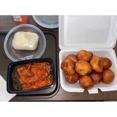 Egusi, efo riro, oxtails, fried meat, fufu and puff puffs