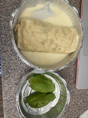 This is what a flimsy egg, bean and cheese burrito looks like. The avocado is not even in the burrito. AN EMBARRASSMENT. Not AUTHENTIC. lol