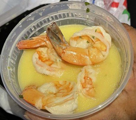 Shrimp Camarones al Ajillo comes with bread. In English shrimp with garlic sauce.