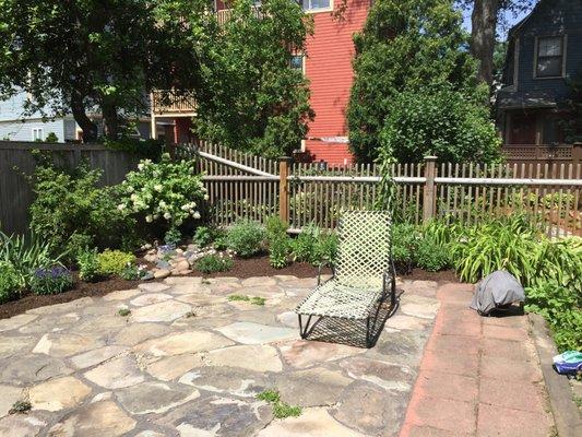 Field stone patio and garden installed by our crews