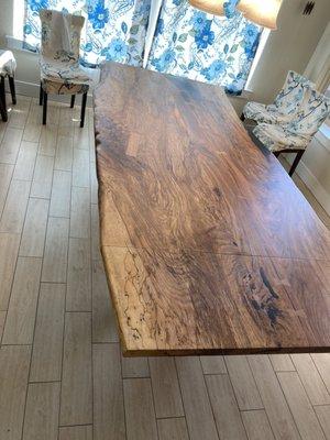 Pecan Live Edge Dining table with Table Extensions on the ends.