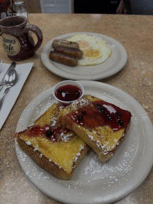 Black coffee, stuffed French toast, and sausage & eggs