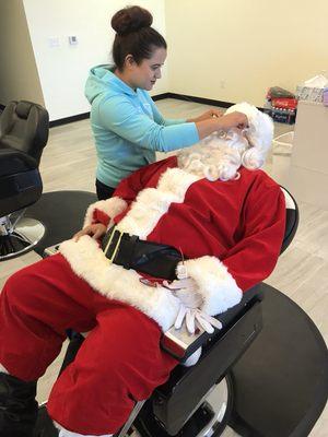 Doing Santa's eyebrow threading...