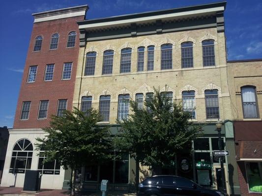 Across the block picture of the 1920's building hosting the bakery and restaurant