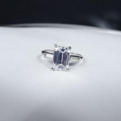 2.40 ct D/vs1 emerald cut, $12500, platinum mtg $1500