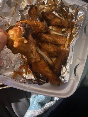 Dry buffalo wings with more grease than sauce.