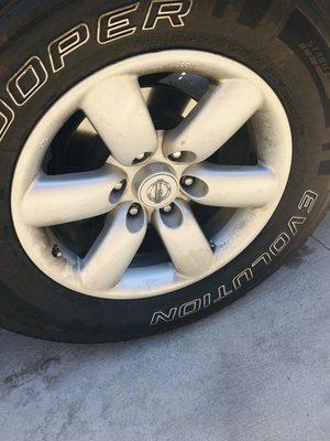 Wheel & tire after wash. Look closer !! wheels dirty and white tire lettering has oil stain along the outer  wall of tire