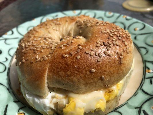 Sesame bagel with egg and cheese