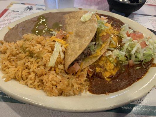 Mexican Plate- enchiladas, crispy taco, beans and rice.