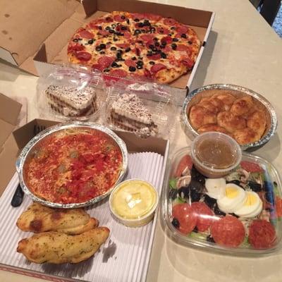 Large olive & pepp pizza, spaghetti & meatballs, garlic bread w/butter dipping sauce, antipasto salad w/Italian, cinnamon rolls & tiramisu!