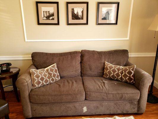 Sitting room of suite, traditional decor, fresh paint