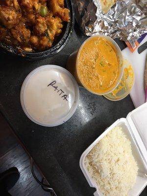 Steamed Basmati Rice, Garlic Chicken, Naan Bread, and Chicken Tikka Masala