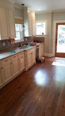 New kitchen, subfloor was changed out to level floor, wall to dining room taken out, new can lights and under cabinet lighting.