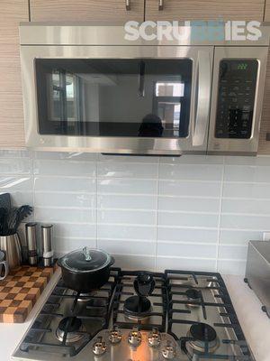 Deep cleaned microwave and stovetop combo