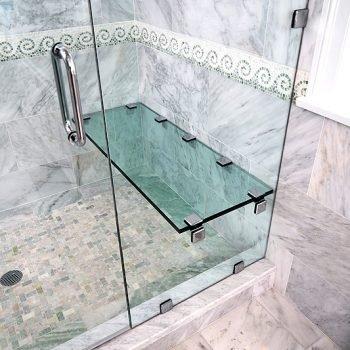 Frameless shower door with glass seat