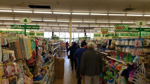 One cashier. Line all the way down an aisle. Nothing new for this place.