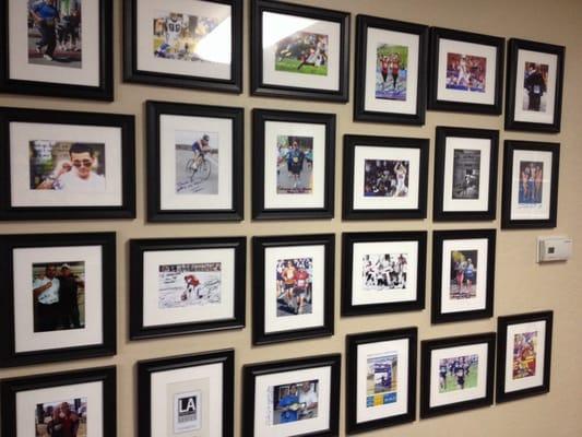 Wall of thanks- autographed pictures from every walk of life: seniors finishing marathons, professional athletes, etc.