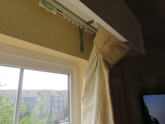 Drapes would not move or close.