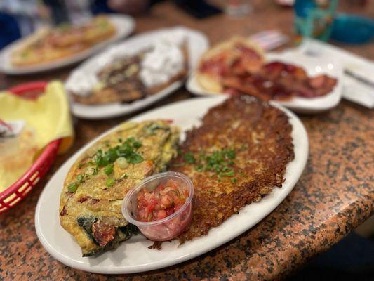 Pacific Salmon Omelette with hash browns and salsa!