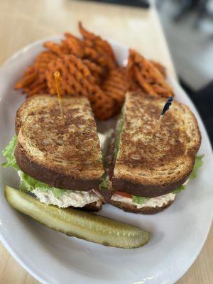 Tuna salad sandwich with sweet potato fries.