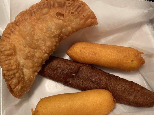 Left to Right: Beef Empastedilla, Sorullitos, and Acapurilla (dark brown piece)