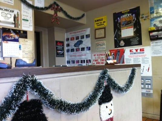 Christmas decorations in the tiny waiting room/front area.