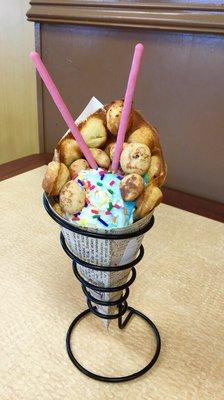 Waffle cone + birthday cake ice cream topped with Panda cookies, sprinkles and Pocky sticks!!