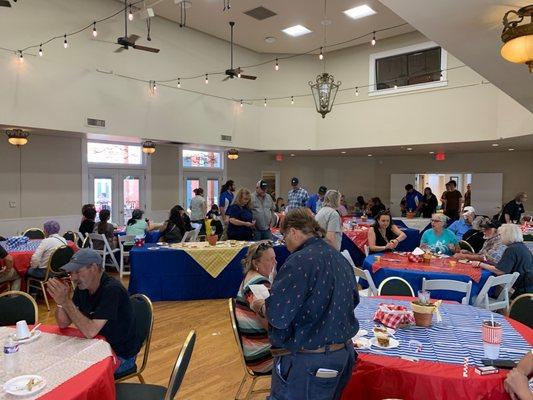 Lots of people enjoying all you can eat pie at the Cisco Piefest!