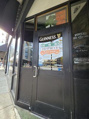 Outside door of Dempseys Public House