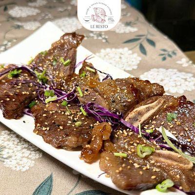 Korean Ribs - Appetizer
 Get ready for tender, juicy Korean ribs that melt in your mouth!
Marinated with bold flavors and grilled to per