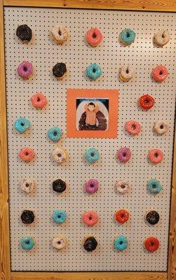 Our adorable donut wall with delicious, colorful TOP DONUTS!