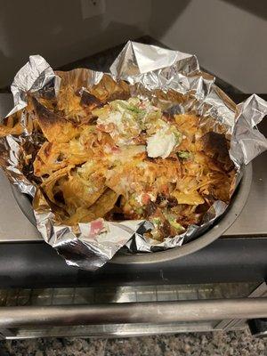 Nachos after more cheese and melting the pre existing.