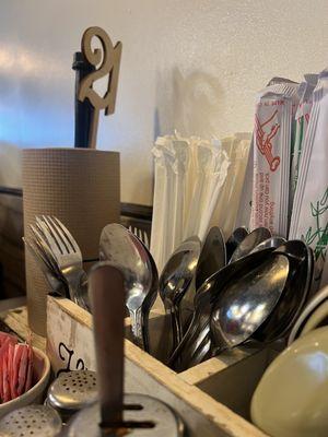 table number, utensils, sauces