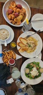 Cajun shrimp, pasta, secret salad, fries and rice