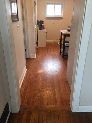 100 year old Oak in the dining room leading into brand new oak floors laid by MH in the kitchen.