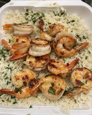 Grilled Jumbo Shrimp Over Rice - Comes with (2) Two Garlic Rolls