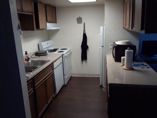 Spacious Kitchen. With full sized stove and refrigerator.