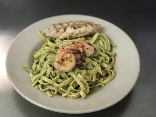 Customer Special Request: Grilled shrimp and chicken over fettuccini with pesto