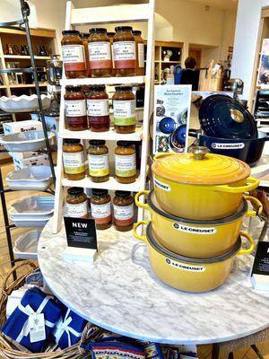 Selection of Creuset cast iron pots and Braising Sauces.