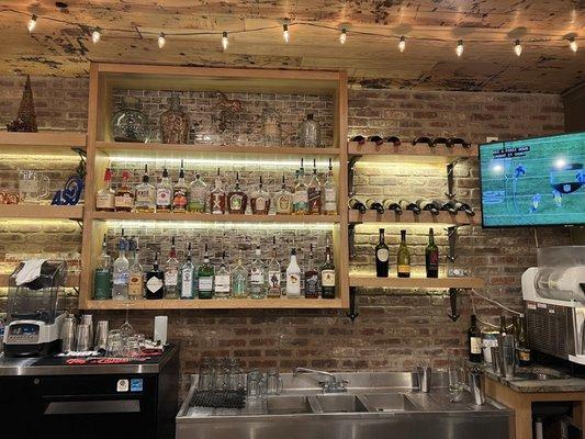 Fully stocked bar ready for all your drinking needs. To include TVs to watch your game and ice cold draft beer.