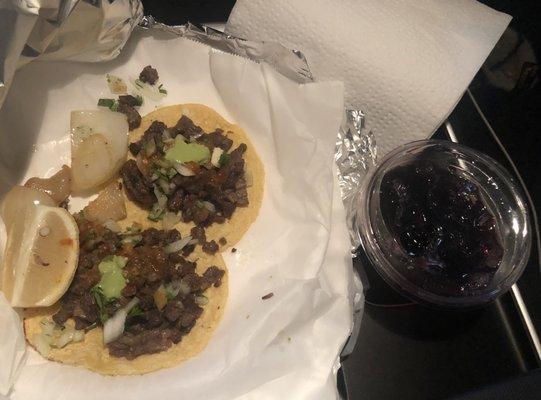 Tacos asada and jamaica water