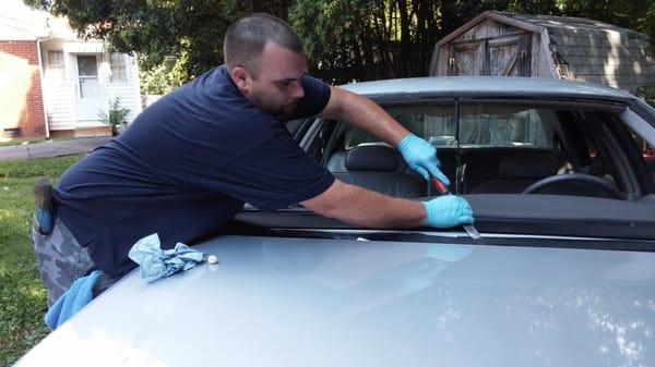 After removing the broken windshield the old adhesive must be trimmed down to between 1/8 to 1/16 of an inch to allow for new...