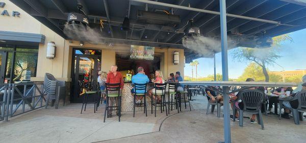 Patio eating area.  Covered with misters