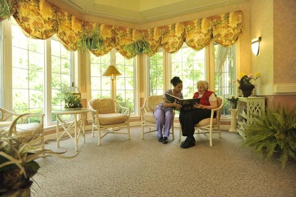 Sunroom, quiet areas and secured gardens for wandering and contemplation.